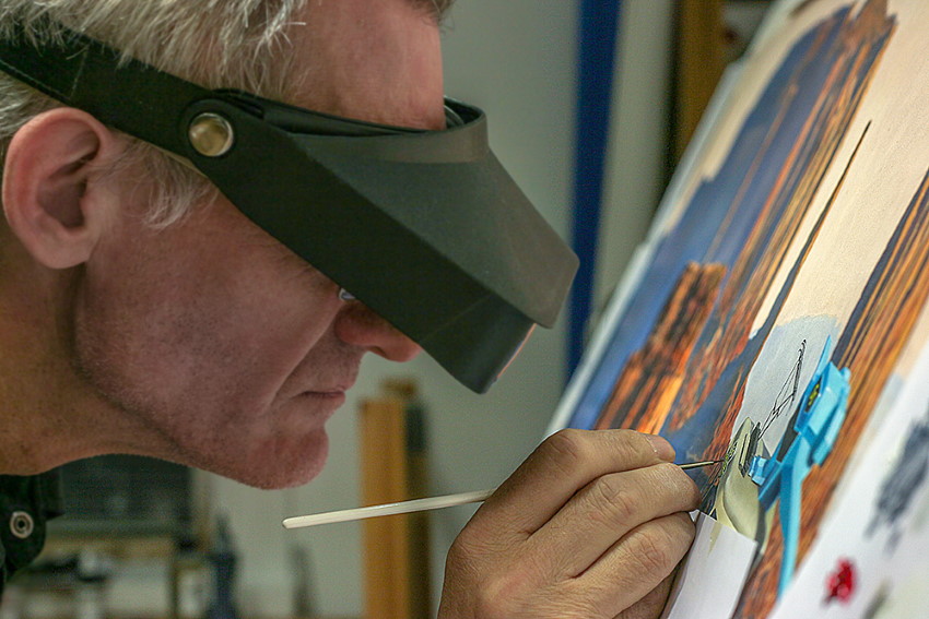 הצייר יוהנס ווסמארק תוך כדי ציור