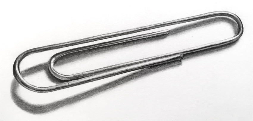 רישום ריאליסטי בעפרונות של מהדק נייר